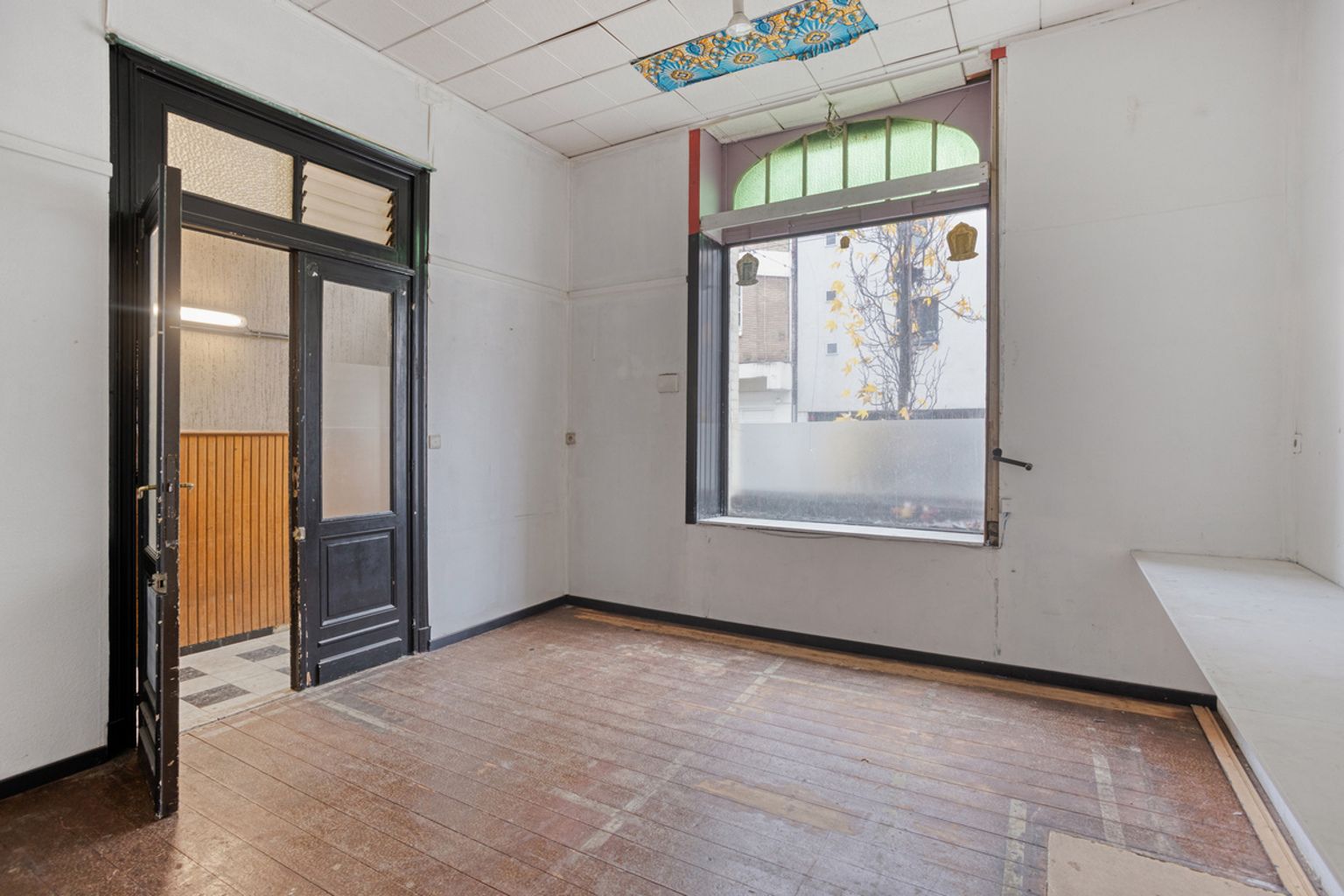 Commercieel gelijkvloers met achterliggend werkplaats foto 7