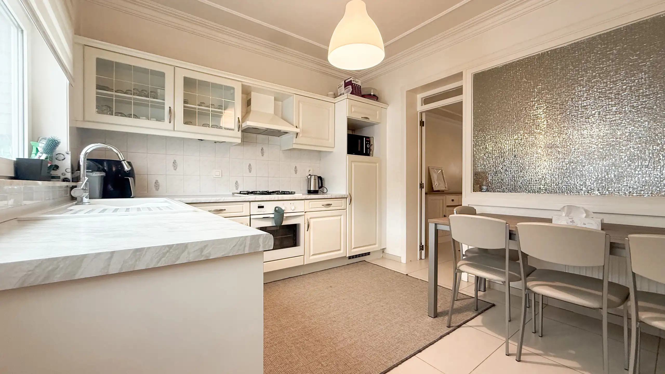 Gezinswoning met 4 slaapkamers centraal in Heusden! foto 8