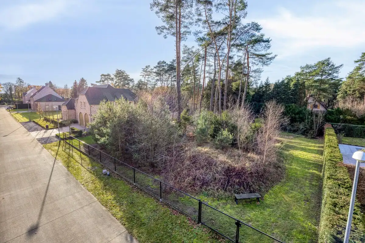 Ruim ingedeelde en kwalitatief afgewerkte villa op een mooi perceel met naastgelegen bouwgrond. foto 44