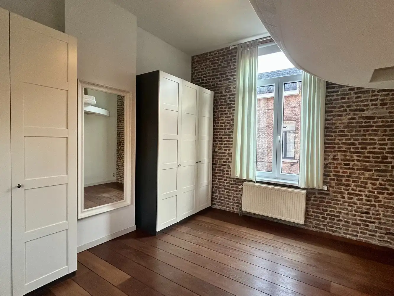 Gezellige rijwoning met prachtige stadstuin en achteruitgang nabij centrum Leuven foto 9