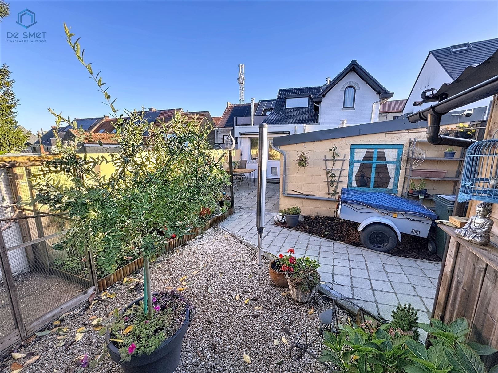 Instapklare woning met 3 slaapkamers, stadstuintje, berging en carport in rustige straat nabij centrum Brakel foto 10
