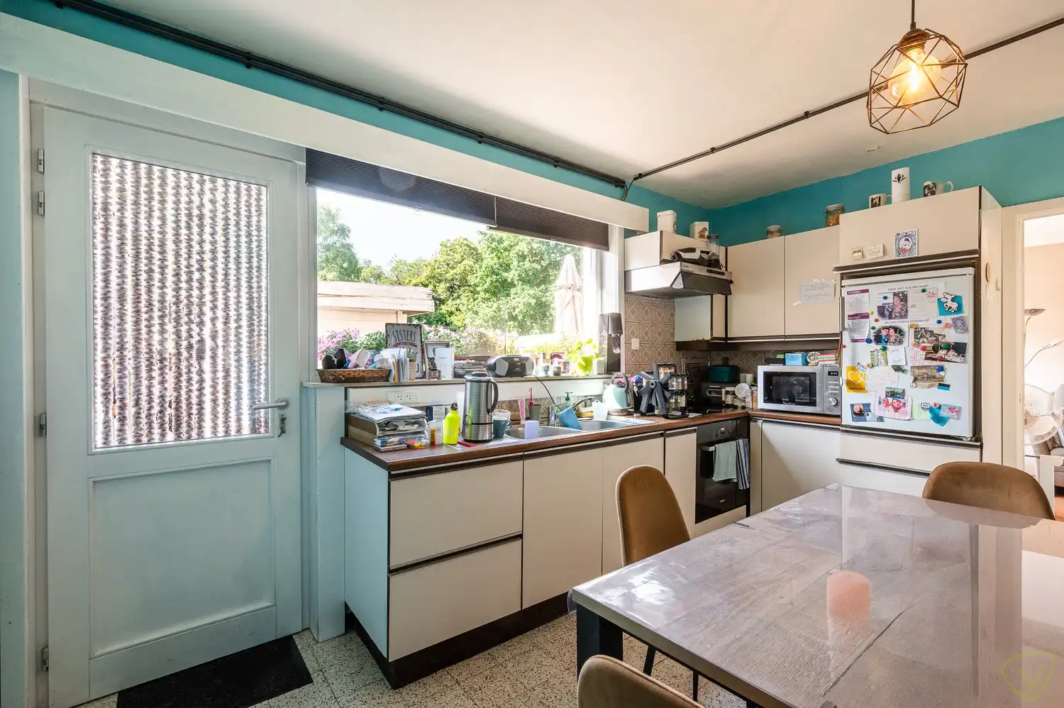 Te renoveren gezinswoning met grote tuin in het centrum van Bassevelde foto 7