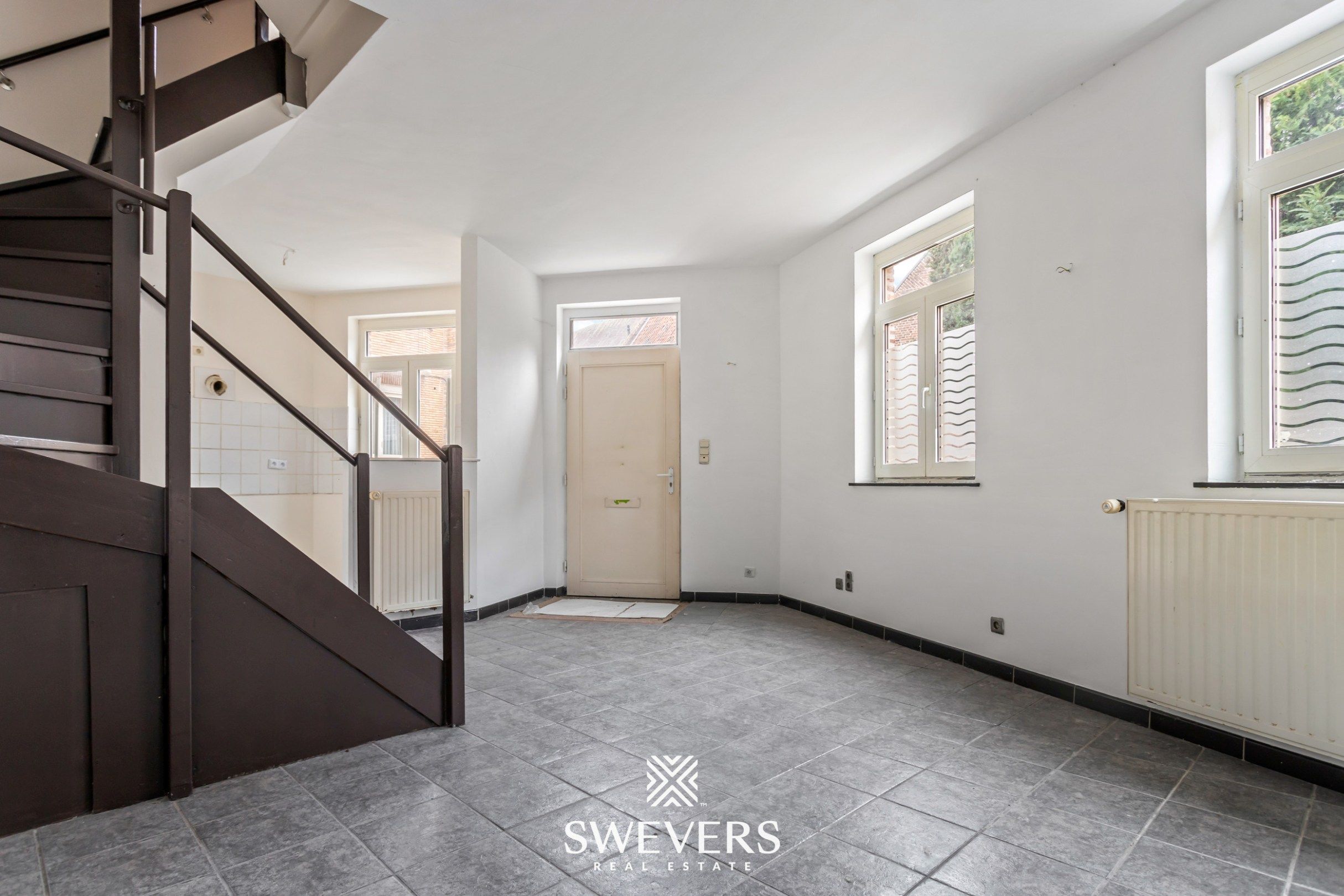 Charmante hoekwoning met potentieel in hartje Tongeren foto 2