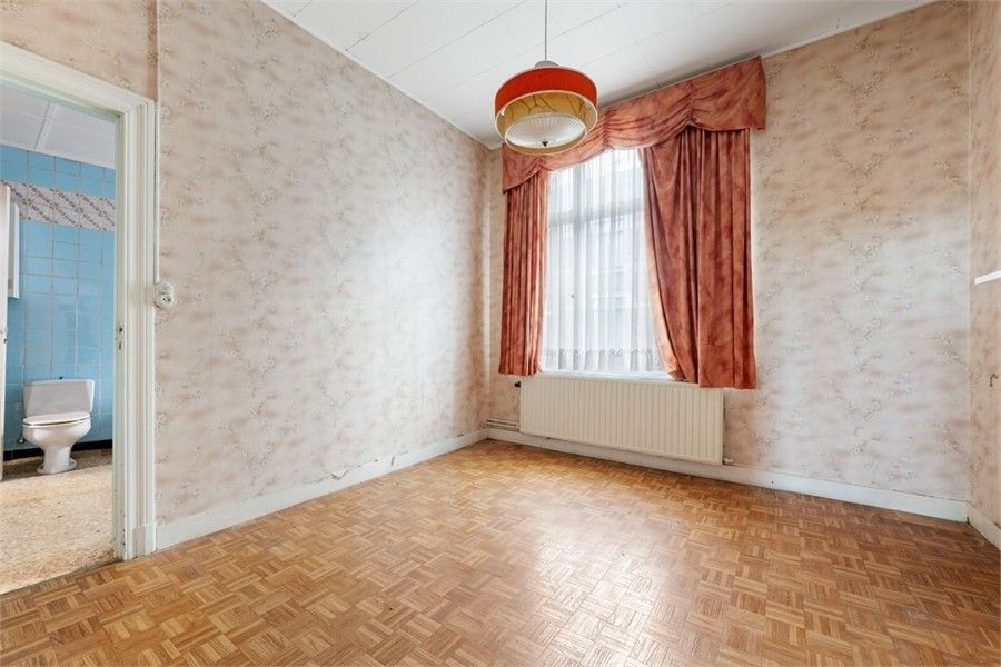 TE RENOVEREN STADSWONING MET VEEL POTENTIEEL IN HET STADSCENTRUM VAN SINT-TRUIDEN foto 23