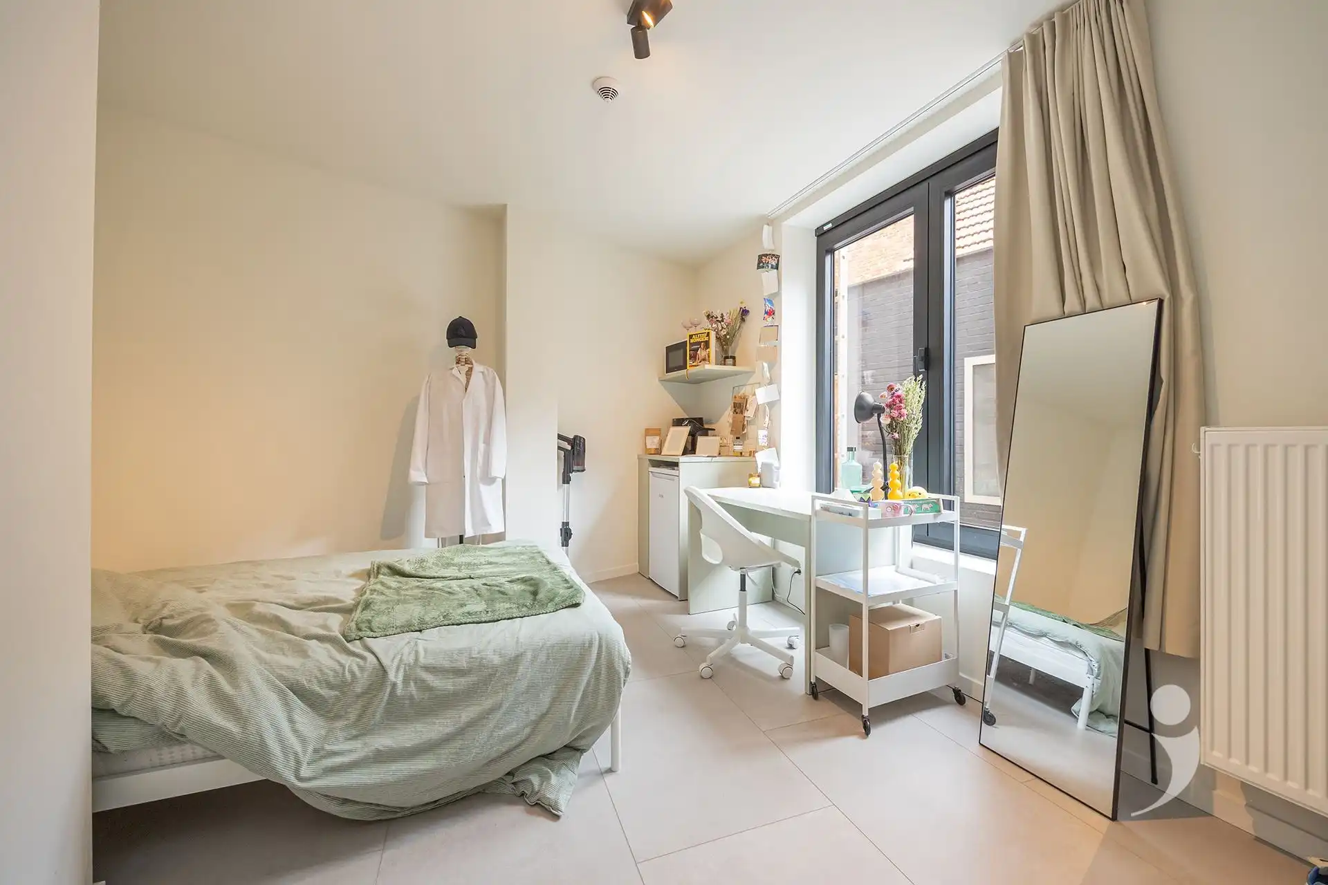 Opbrengsteigendom met 21 kamers, 1 studio en grote handelszaak foto 20