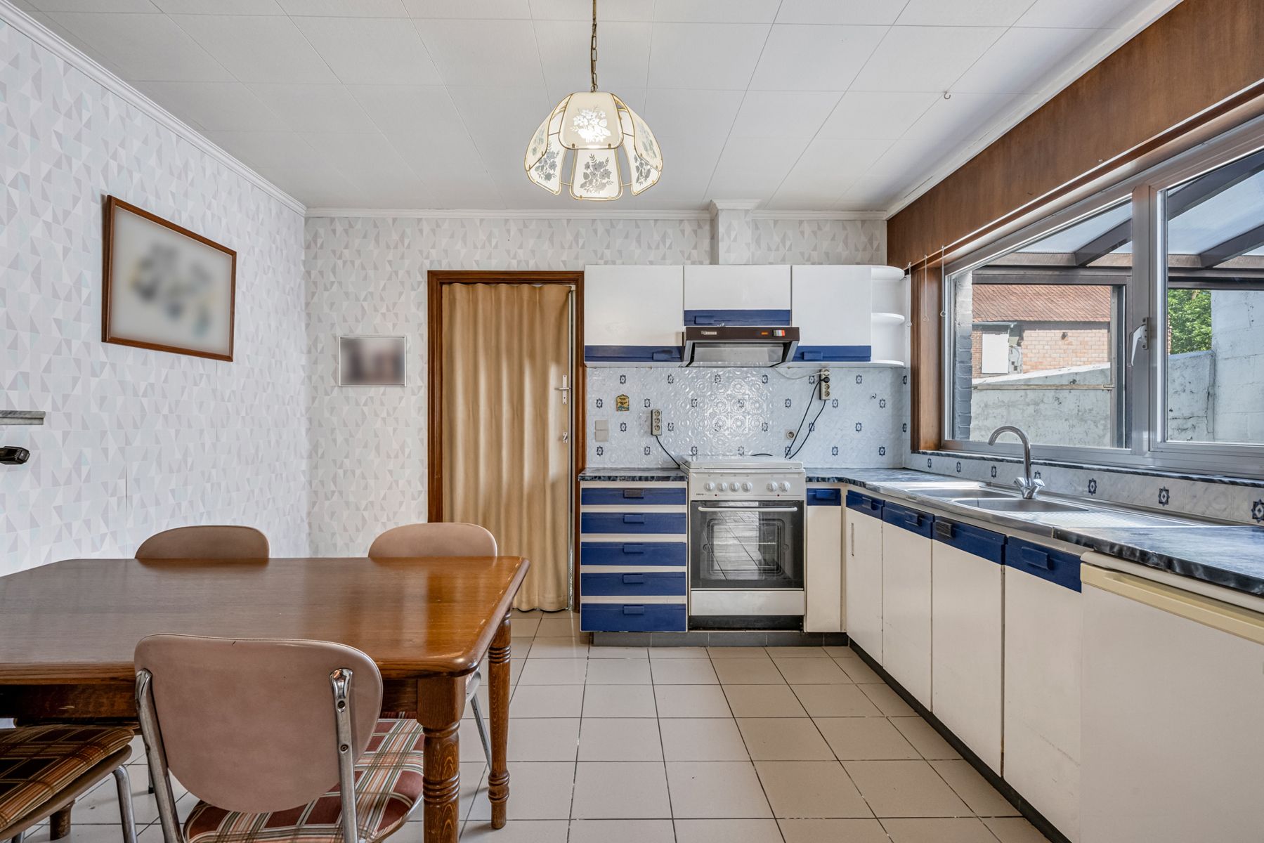 Te renoveren gezinswoning met inpandige garage en tuin  foto 10