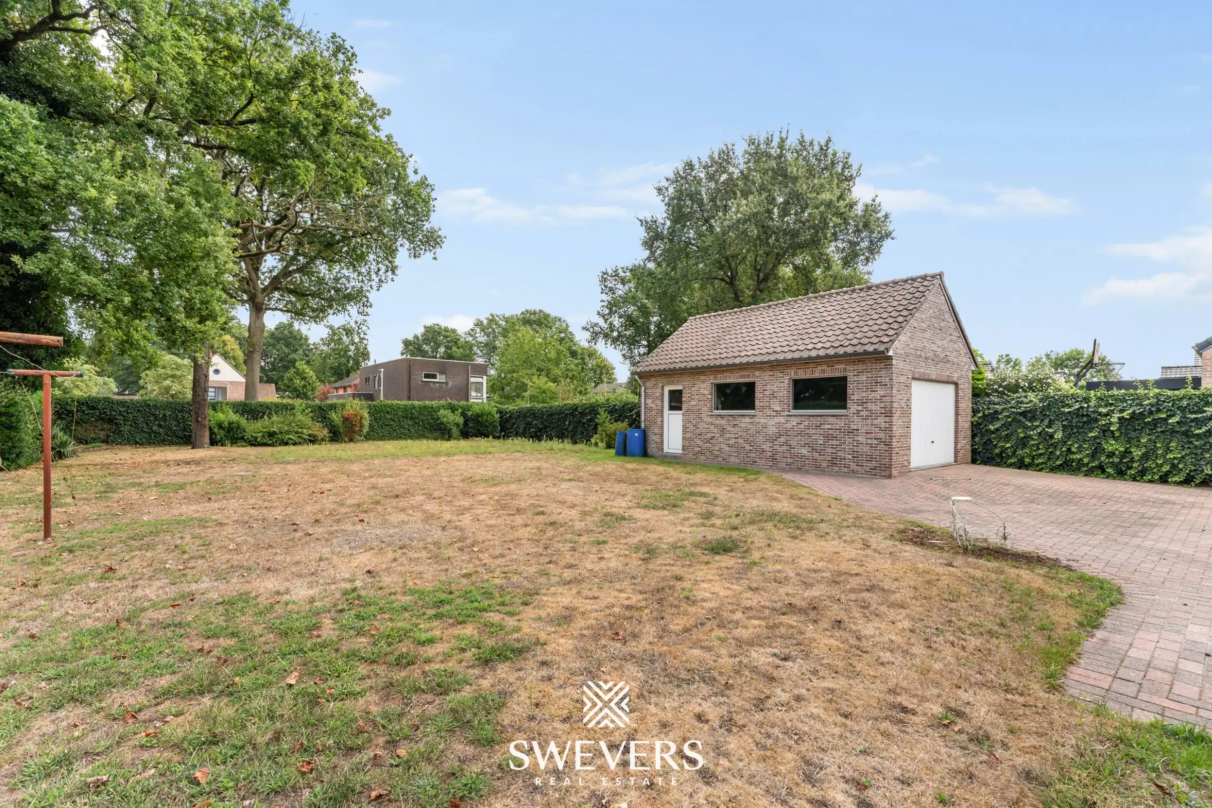 Gelijkvloerse woning met 3 slaapkamers, garage en prachtig groen perceel vlak bij Zolder-Centrum foto 33