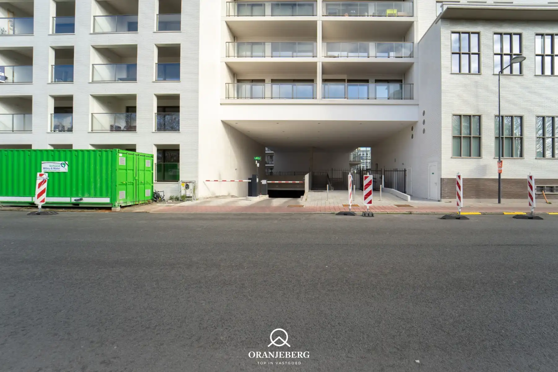 Nieuwbouw autostaanplaats te huur in afgesloten parkeergarage nabij Gent centrum foto 7