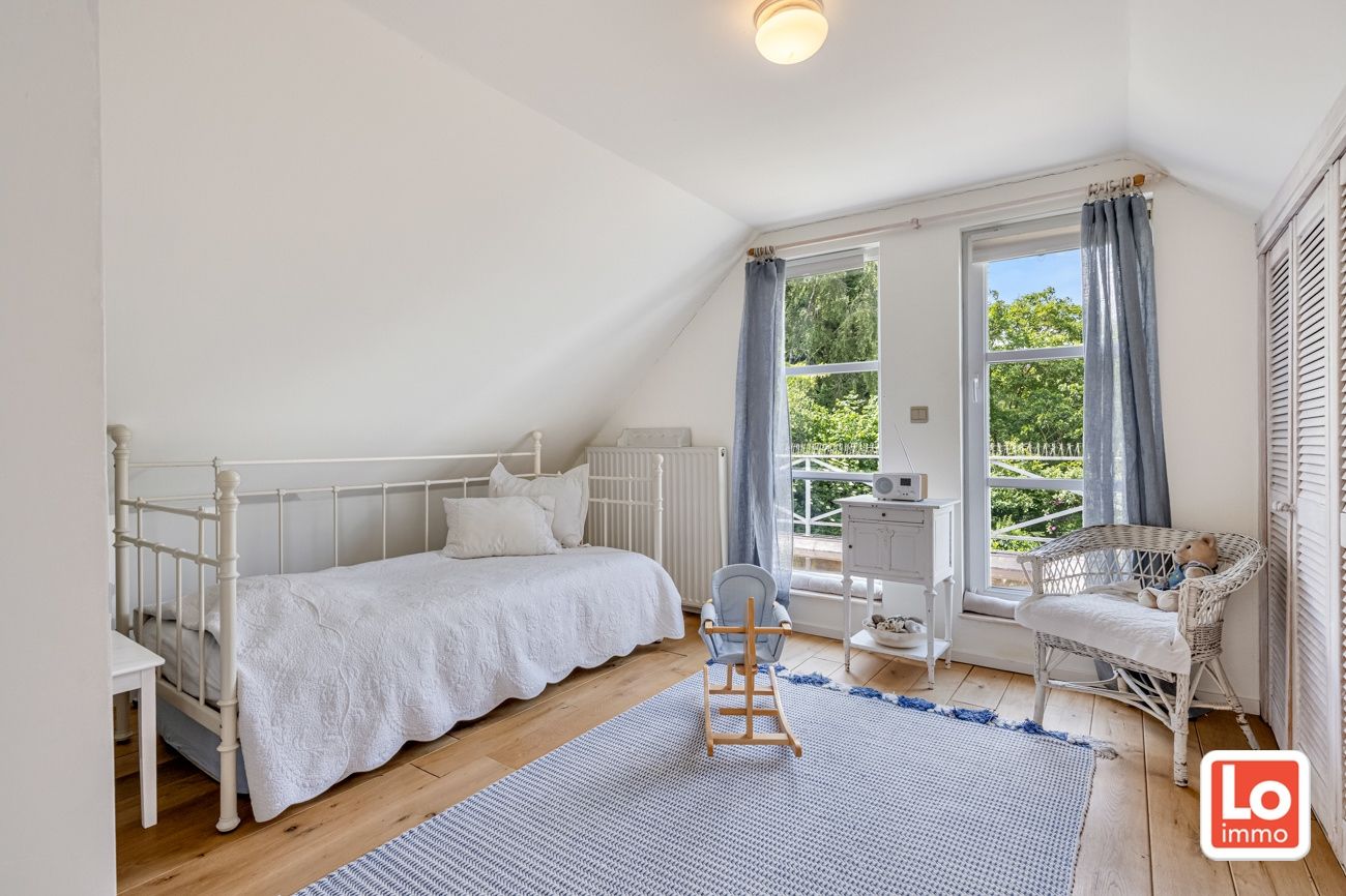 VERKOCHT! Charmante open woning met carport en héél grote aangename tuin gelegen op een toplocatie vlakbij het centrum van Zaffelare! foto 30