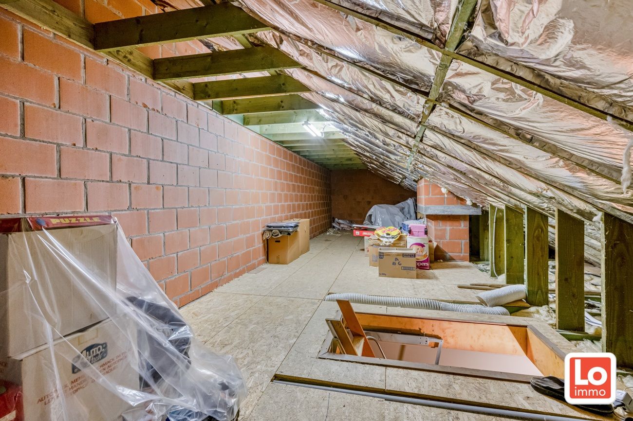 Instapklare en energiezuinige halfopen woning met inpandige garage op een rustige ligging en toch op wandelafstand van het centrum van Lochristi en de groene wandelregio rond de Rozelaredreef/Kasteeldreef! foto 14