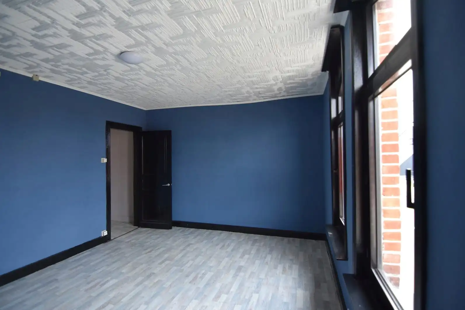 Te renoveren rijwoning met goeie ligging foto 18