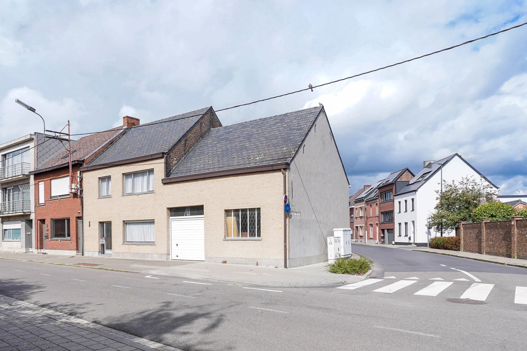 Gunstig gelegen, op te frissen HOB-woning te Kapelle-Op-Den-Bos foto 3