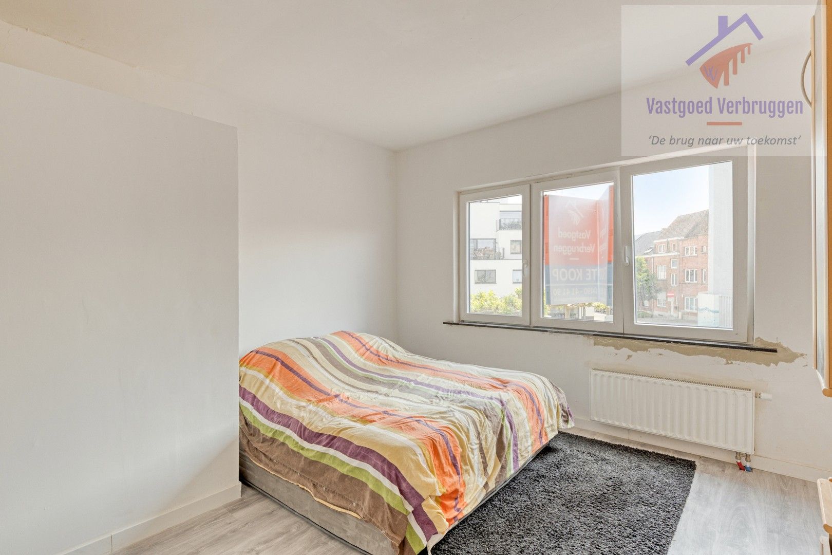 Grotendeels gerenoveerde woning met 4 slaapkamers in centrum Aalst foto 6
