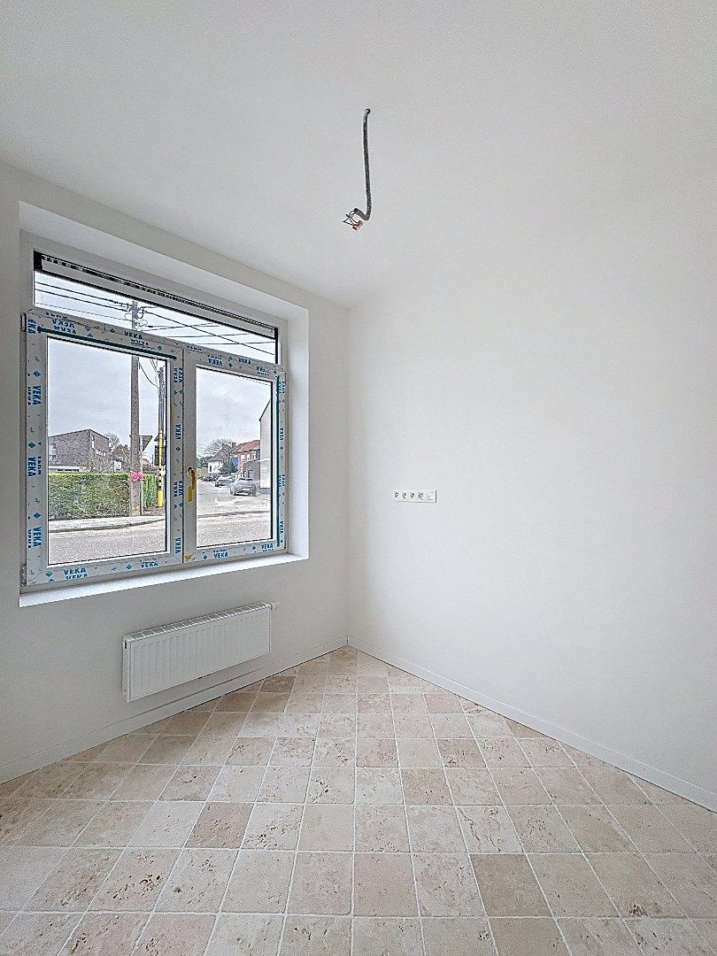 Elegant wonen in Tienen: gerenoveerde rijwoning met 3 slaapkamers en zuidwestgerichte tuin. foto 4