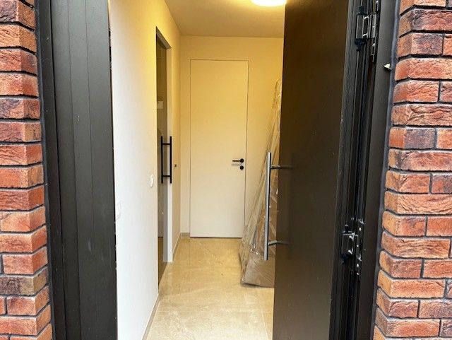 Exclusief gelijkvloers duplex appartement met 3 slaapkamer en 2 badkamers foto 3