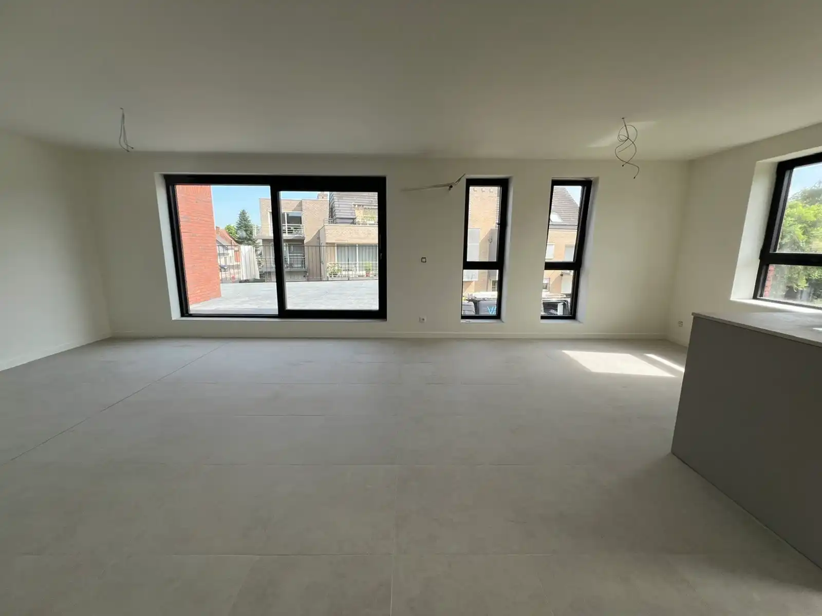 Nieuwbouwapp met 1slpk, ZW terras (26m²) en parking foto 8