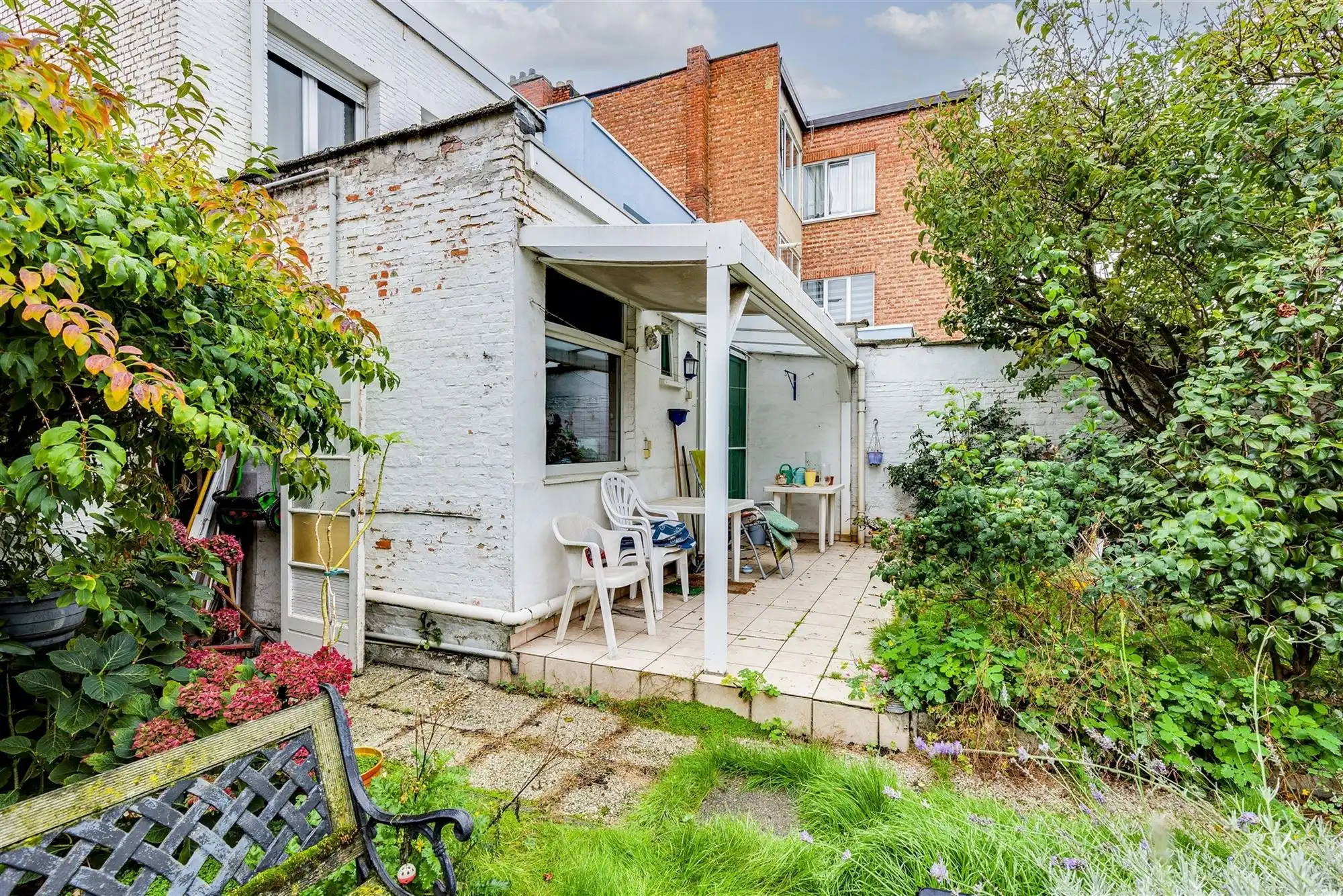 Te renoveren woning met tuin in Merksem foto 17