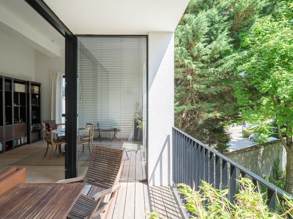 Ruim en lichtrijk 2-slaapkamerappartement met zonneterras in een groene en rustige omgeving vlakbij de Coupure. foto 11