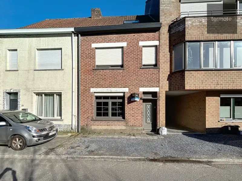 Knusse rijwoning foto {{pictureIndex}}