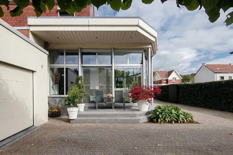 Knap afgewerkte, energiezuinige en ruime woning met vier slaapkamers, guesthouse/praktijkruimte op een centrale (maar toch bosrijke!) locatie te As foto 15