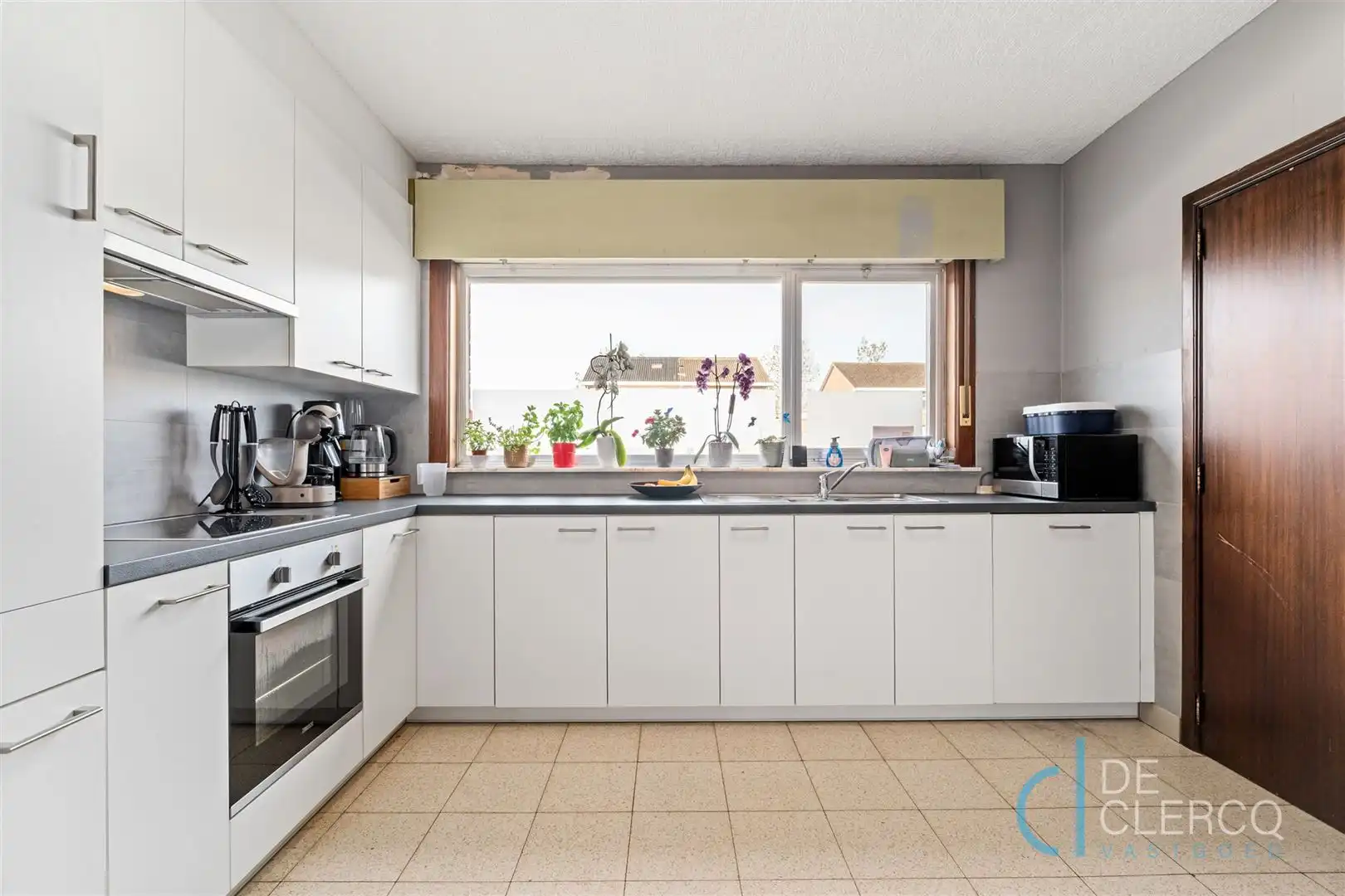 Halfopen woning met garage én grote oprit te koop Lochristi foto 5