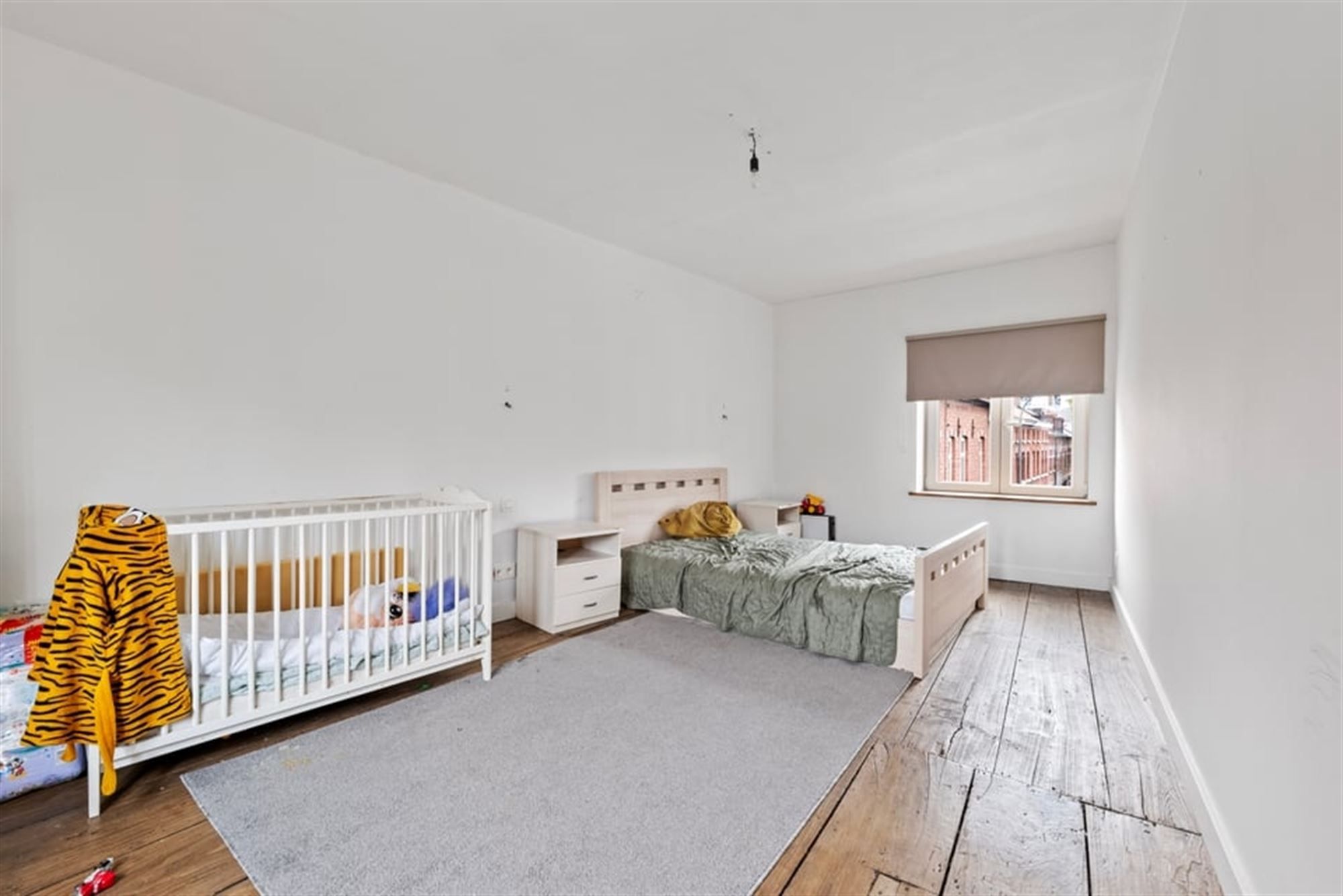 INSTAPKLARE STADSWONING MET DIRECT RENDEMENT IN HET HART VAN DE STAD  foto 24