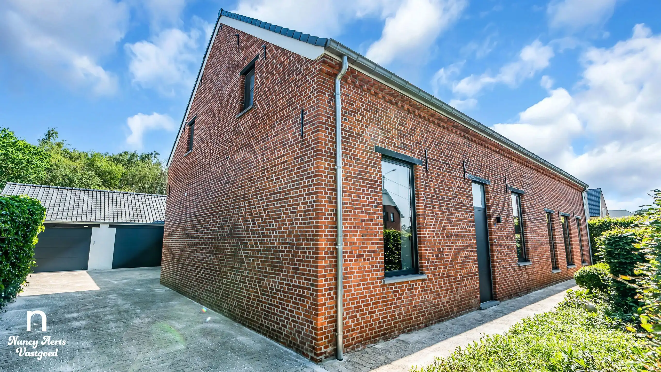 Luxe villa met karakter en hedendaags comfort in het groen foto 39
