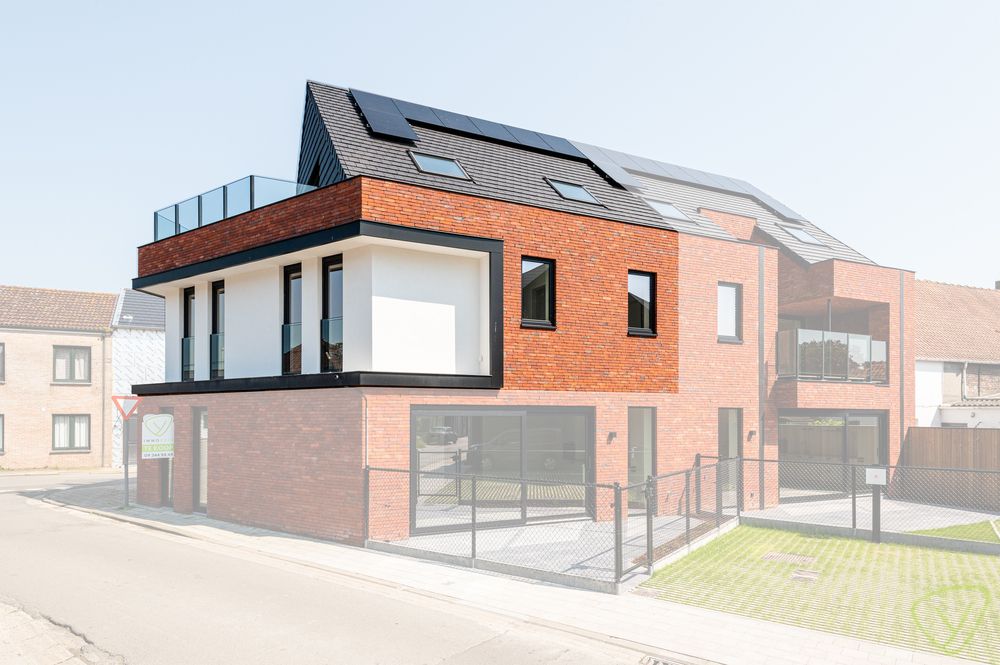 Nieuwbouw duplexappartement te koop in het centrum van Boekhoute foto {{pictureIndex}}