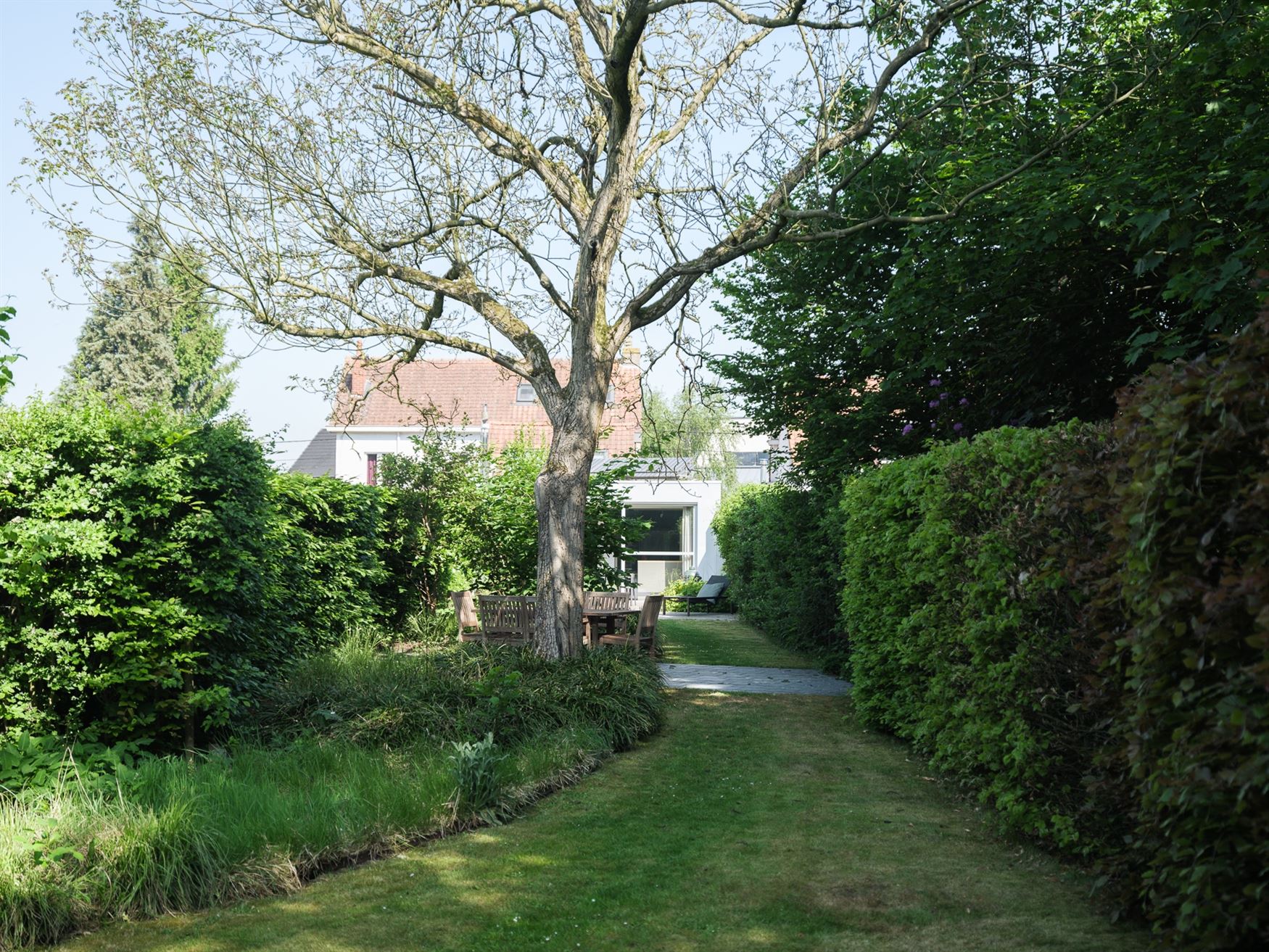Instapklare gezinswoning met schitterende tuin foto 3