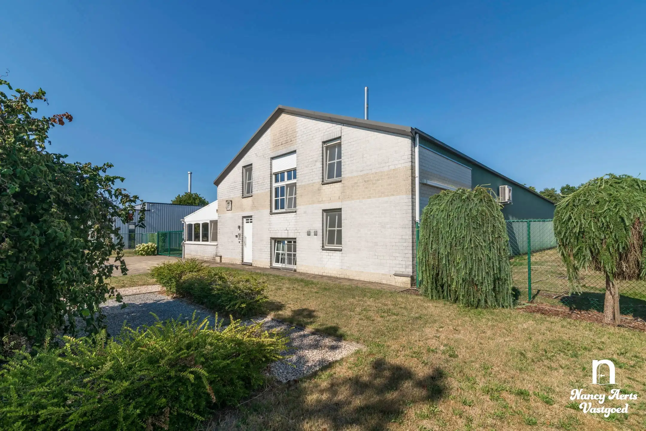 Loods van 550 m² met kantoor en woning met 4 slaapkamers foto 17