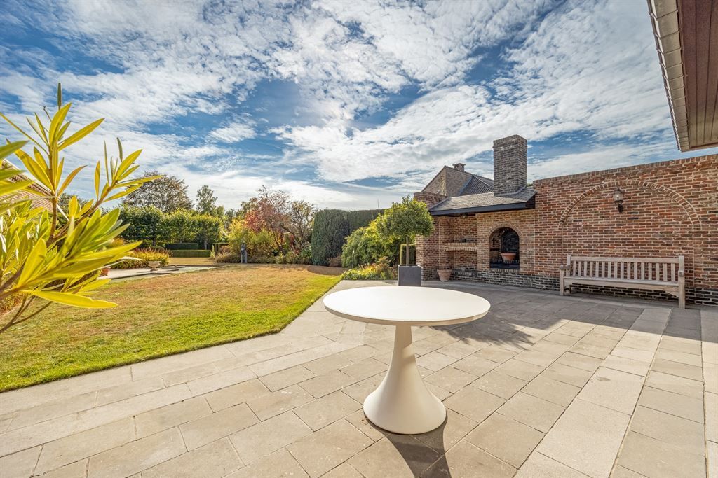 Statige, ruime woning met zuidgerichte tuin! foto 24