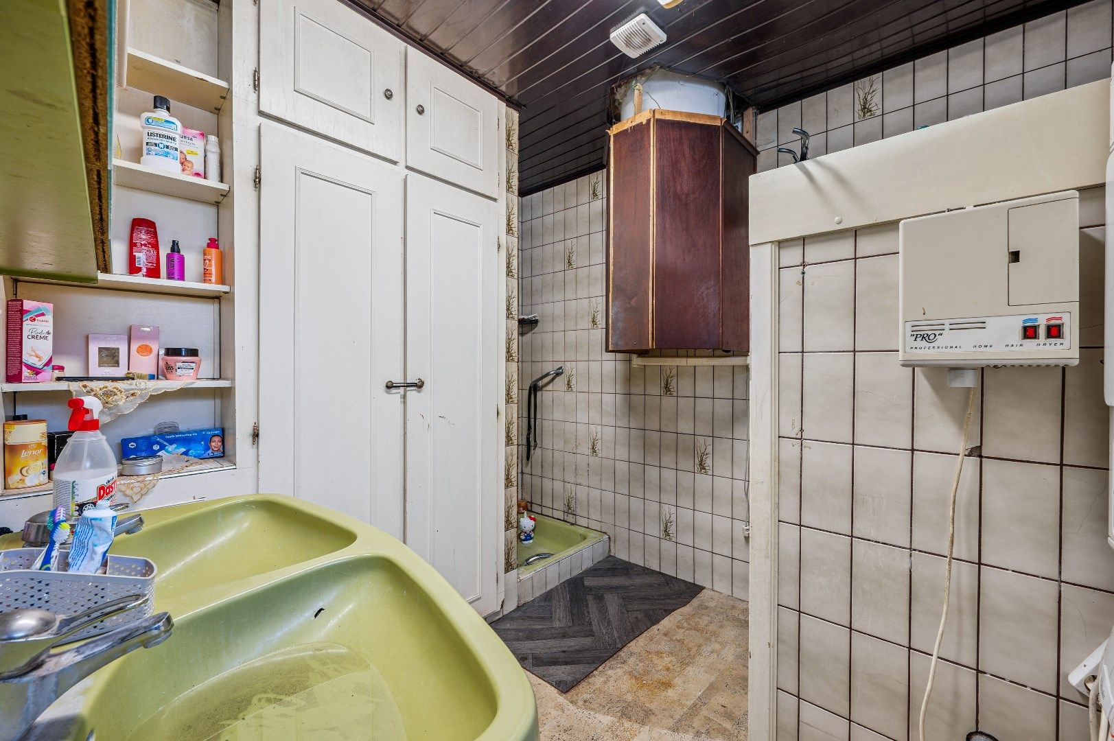 Te renoveren rijwoning met potentieel in de buitenrand van Tienen foto 13