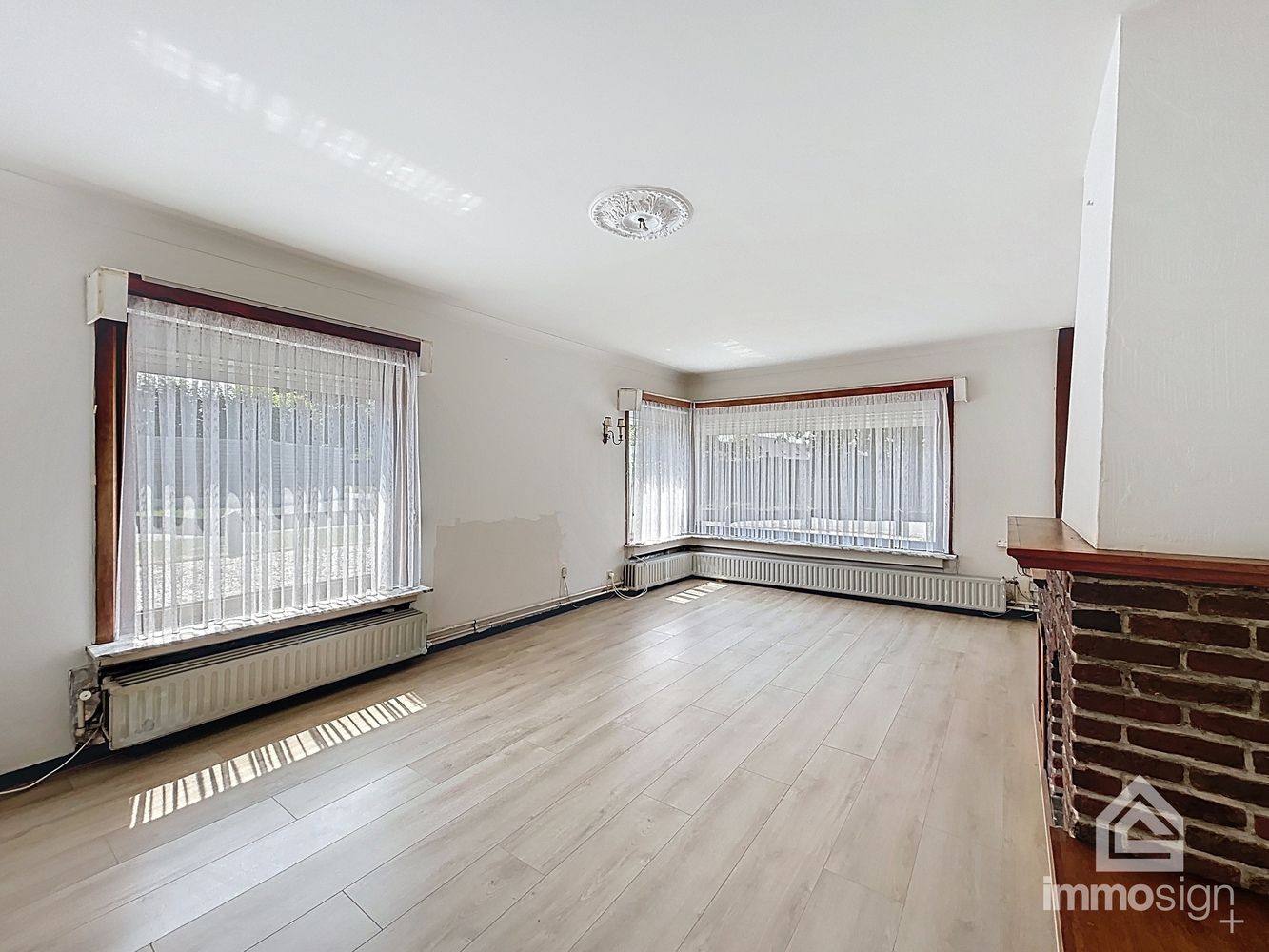 Charmante gezinswoning met potentieel op ruim hoekperceel in hartje Eksel foto 7