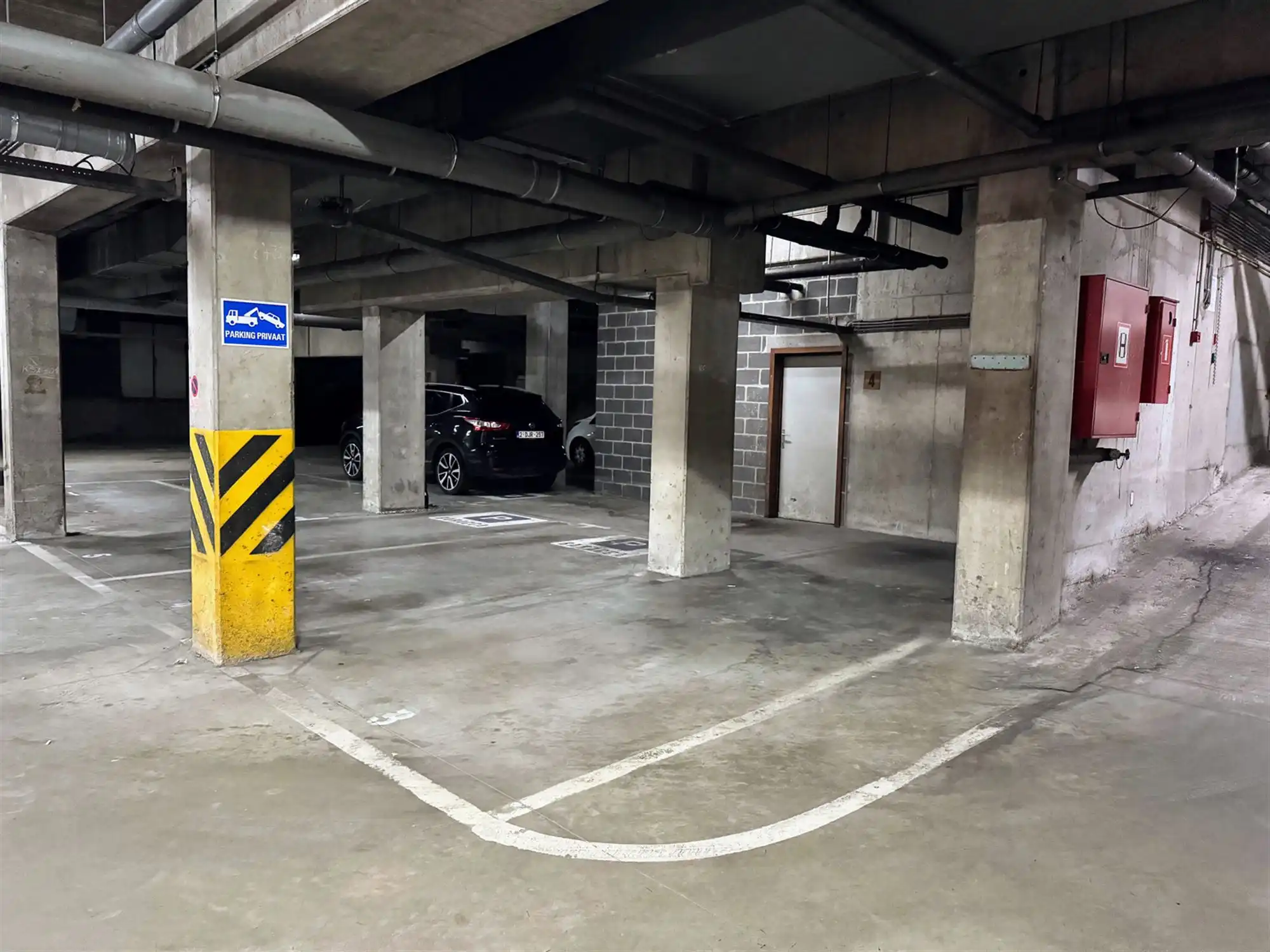 Ondergrondse autostaanplaats Stadskern Leuven foto {{pictureIndex}}