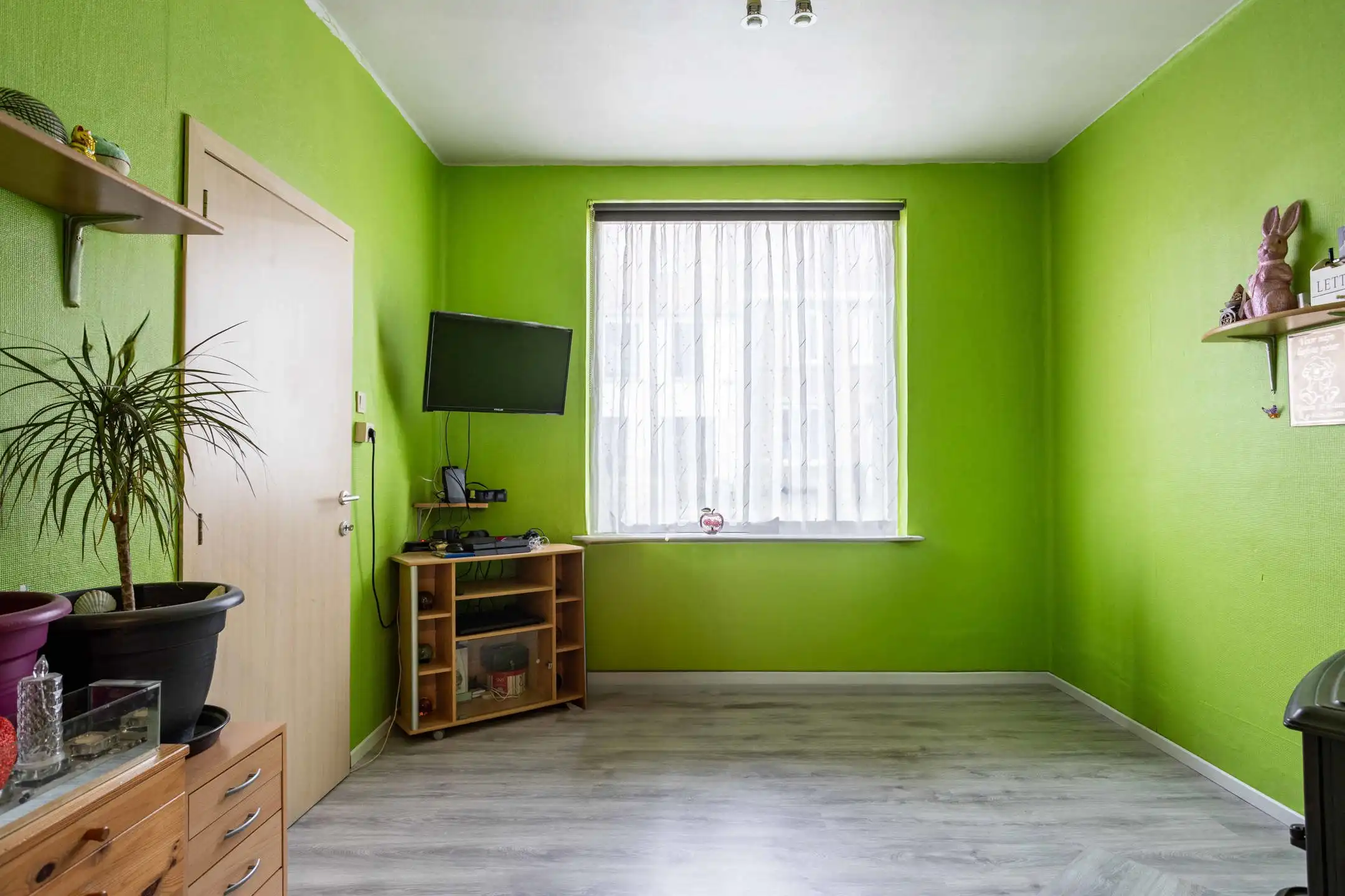 Instapklare rijwoning met garage op rustige locatie in Ronse foto 4