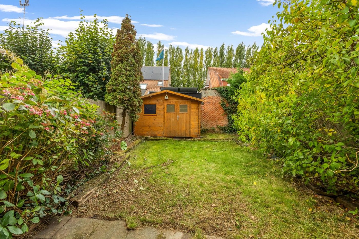 Centraal gelegen, op te frissen woning met 2 à 3 slpk., inpandige garage en tuin foto 28