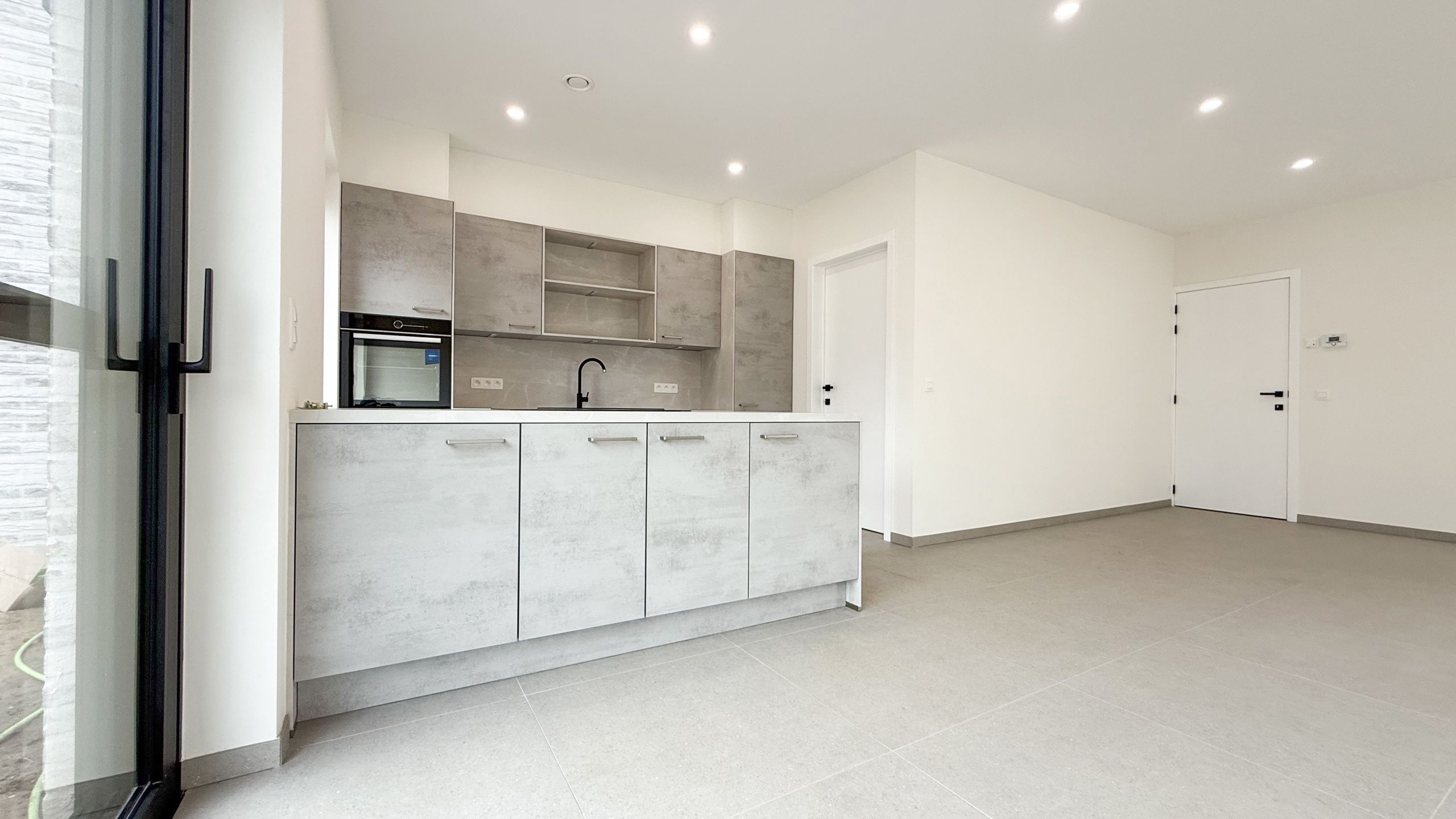 Nieuwbouwappartement met 3 slaapkamers en tuin! foto 4