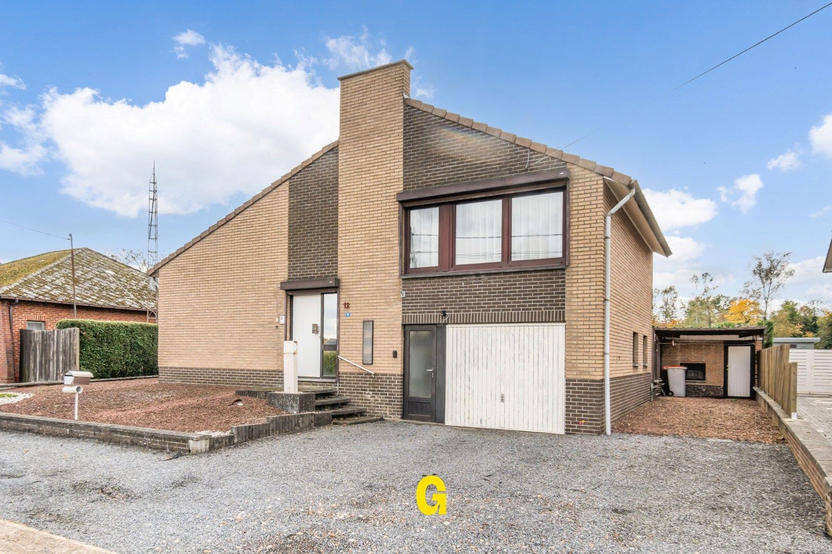 ** IN OPTIE ** Vrijstaande split-level woning met zuid gerichte tuin op 14a 49ca, in een geliefde buurt vlakbij het centrum foto 2