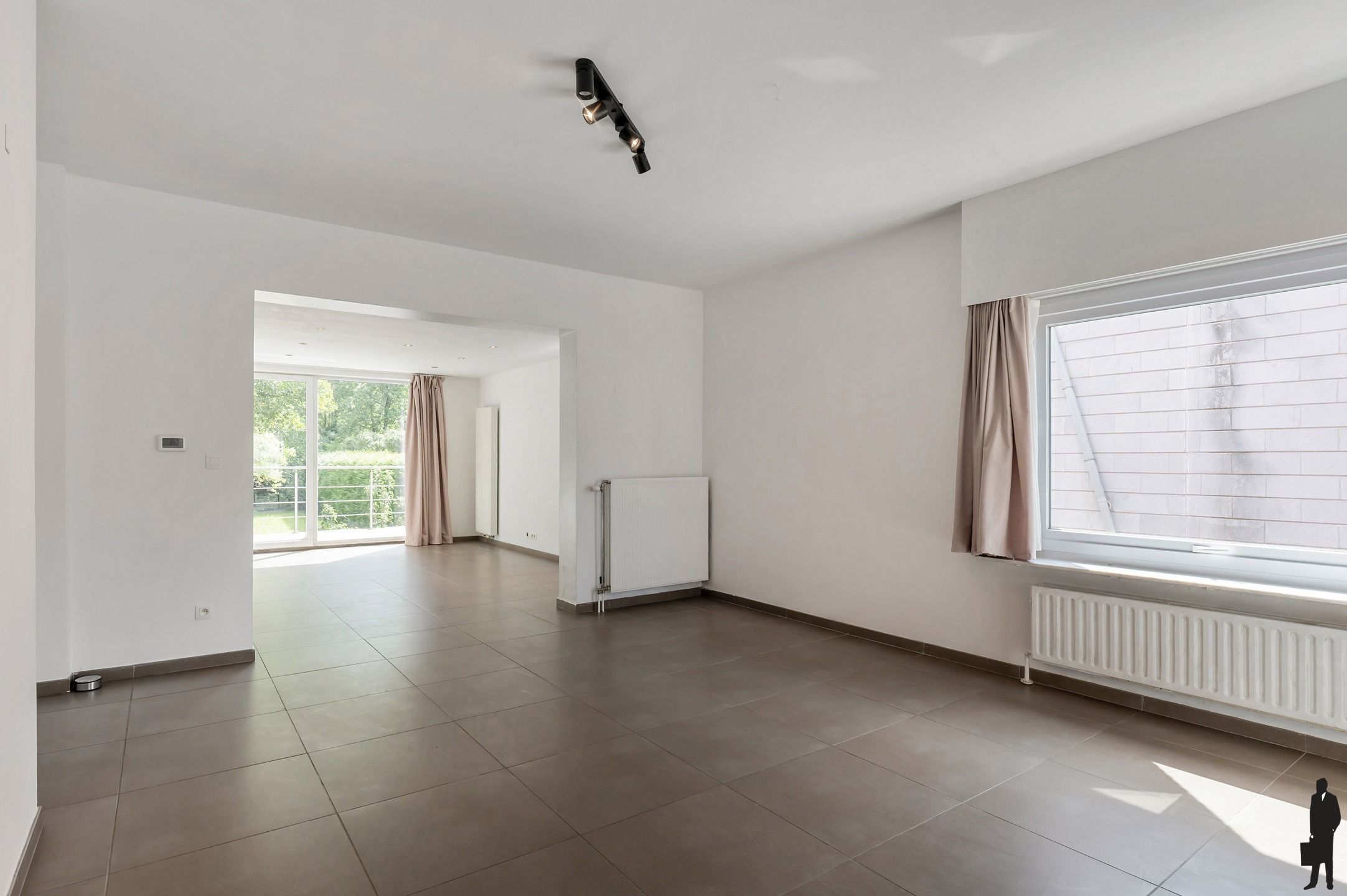 Lichtrijke woning met 4 slk’s, volledig onderkelderd en ZW-tuin op 575 m². foto 4