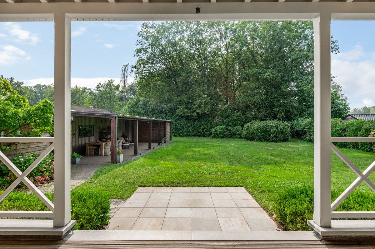 Charmante woning en instapklare woning met 3/4 slaapkamers op 1683 m² met polyvalent bijgebouw en ZW gerichte privetuin met zicht op groen. foto 5