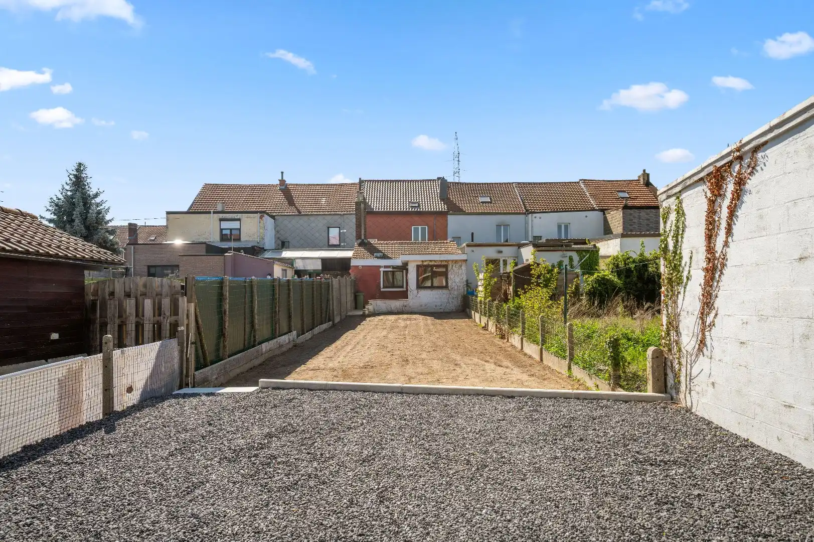 Op te frissen rijwoning op de Tiense stadsrand met tuin en 2 parkeerplaatsen foto 26