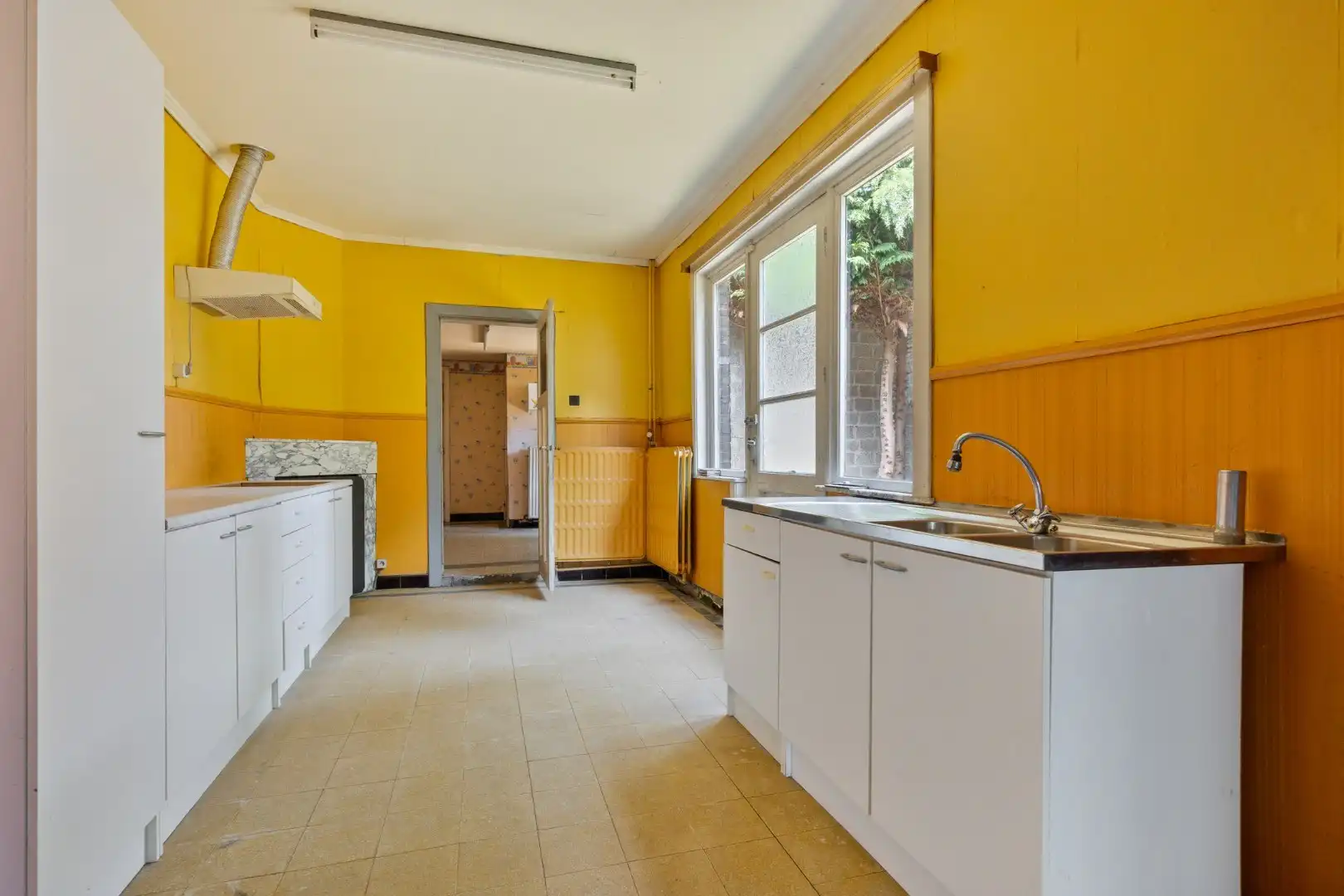 Ruime te renoveren woning met 3 slaapkamers in Lubbeek met doorgang langs het perceel van de buren. EPC: 736 KWH/m² foto 11