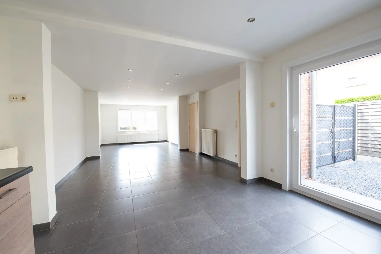 Instapklare halfopen bebouwing met garage op 210 m² te Zulte foto 2