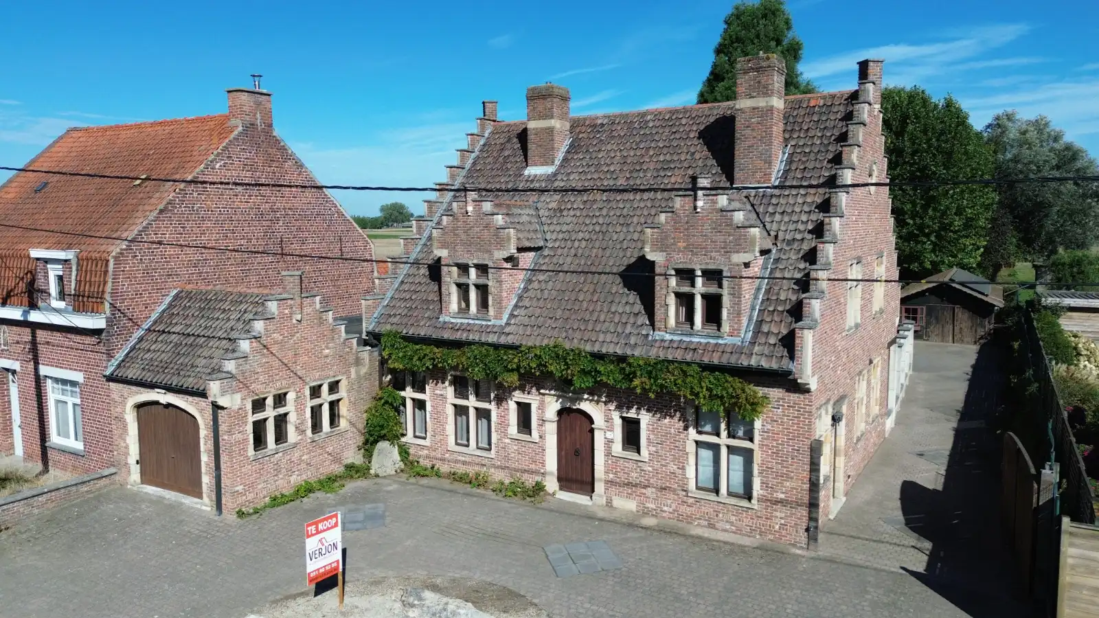 Karaktervolle halfopen woning op een riant perceel van 2.144 m² in Sint-Eloois Winkel! foto 20