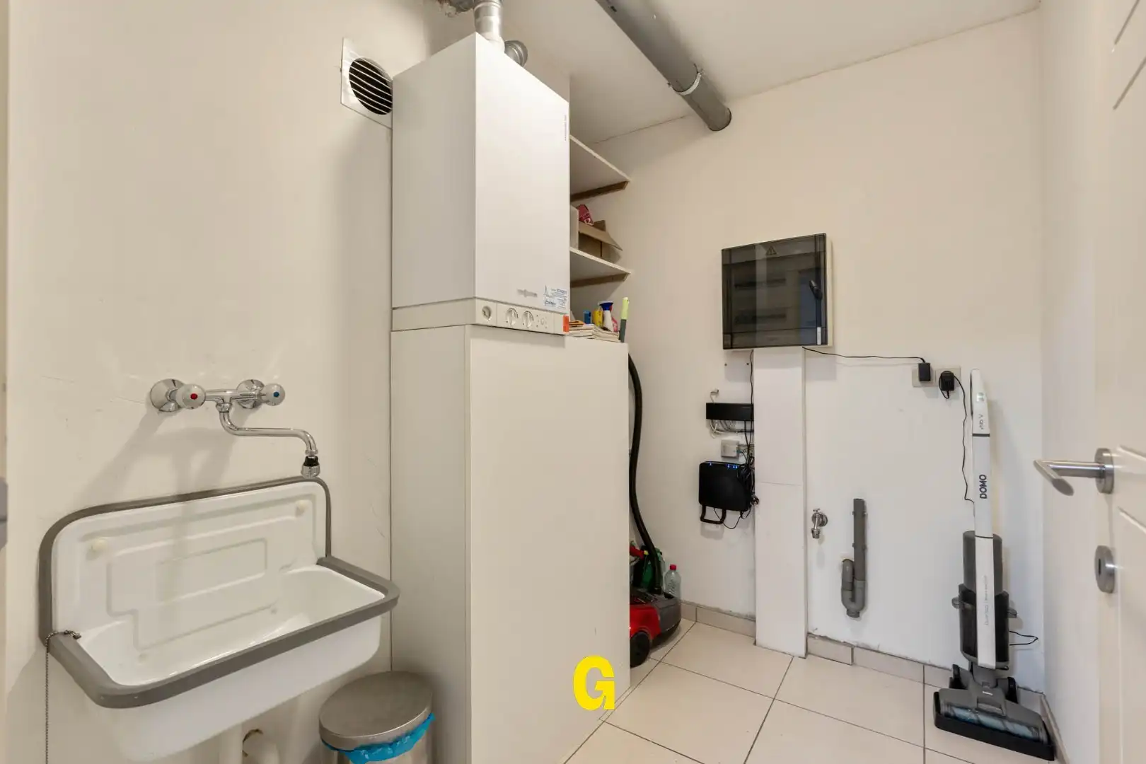 Netjes verzorgd en comfortabel ingericht gelijkvloers appartement met ruim terras, standplaats en kelderberging op wandelafstand van de markt foto 11