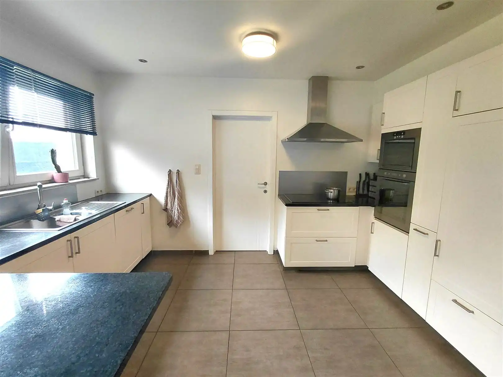 TE HUUR: Gezinswoning met 4 slaapkamers in een doodlopende straat te Zolder! foto 9