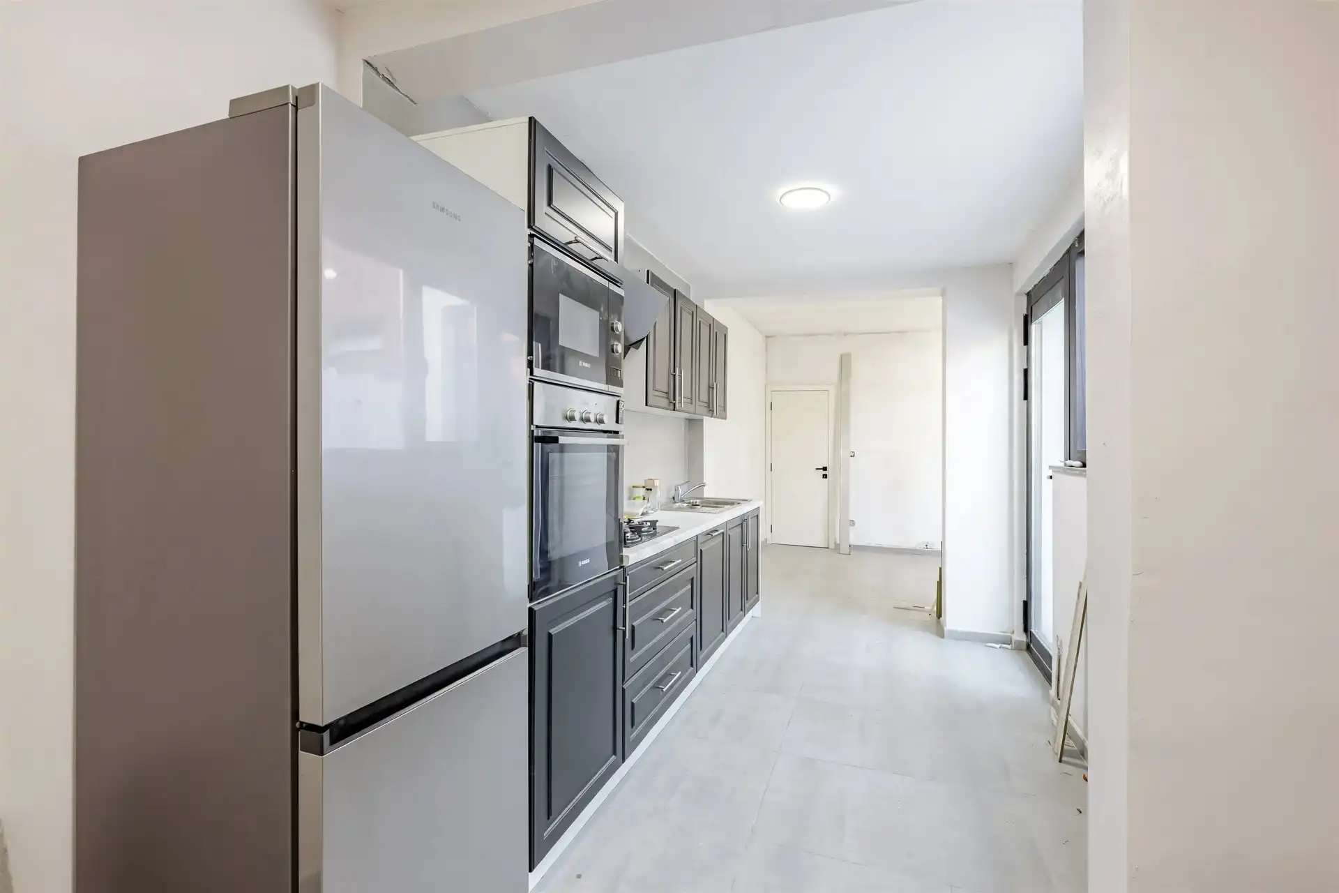 Vernieuwde gezinswoning op diep perceel van 405 m² foto 5