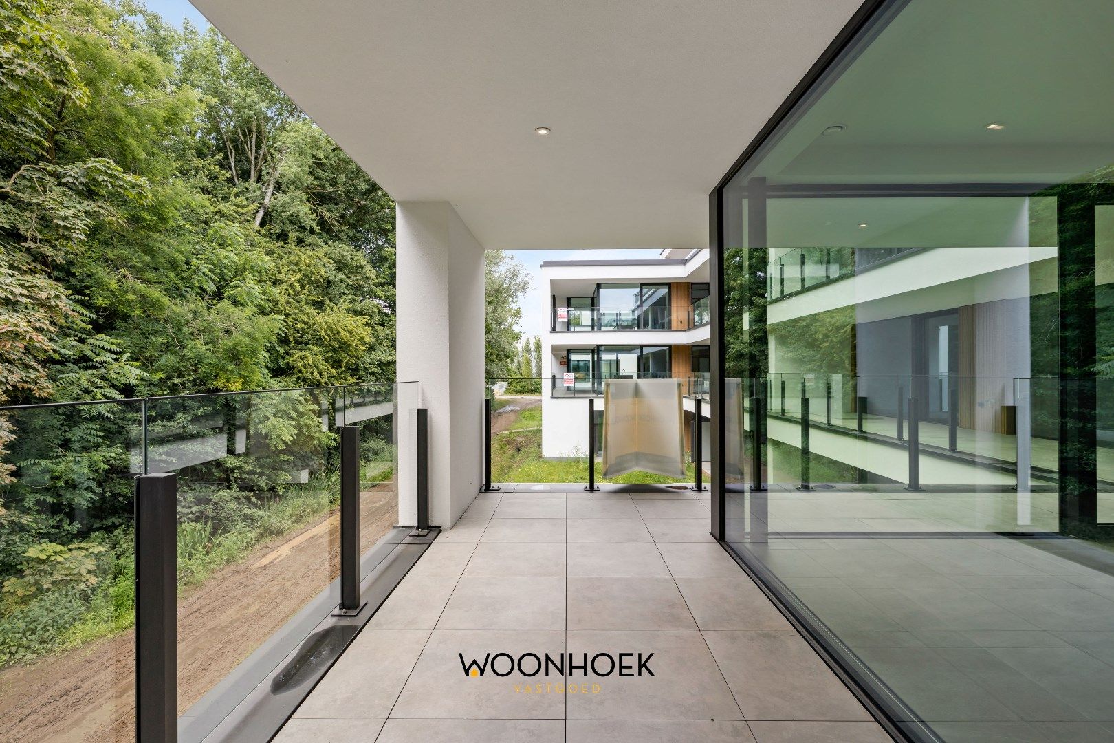 Luxueus 3-slpk nieuwbouwappartement OEVERPARK te Lokeren foto 11