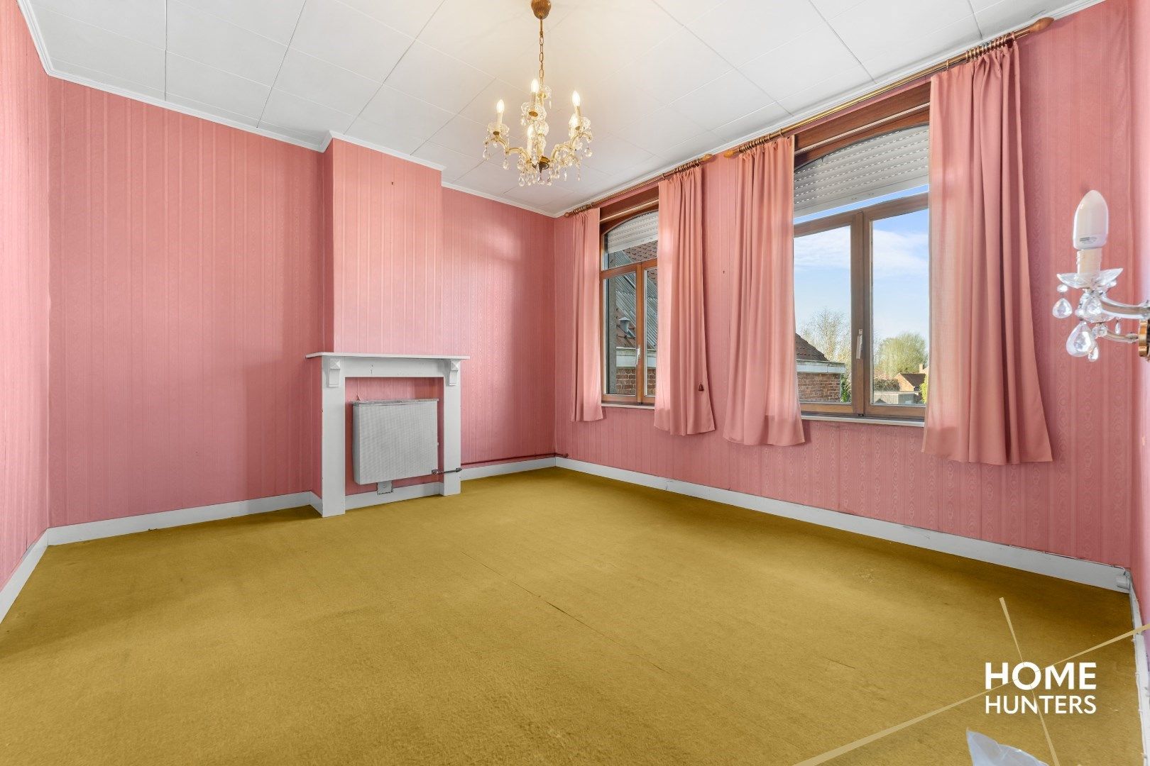 Authentiek herenhuis in Mesen – een renovatieparel met potentieel foto 16