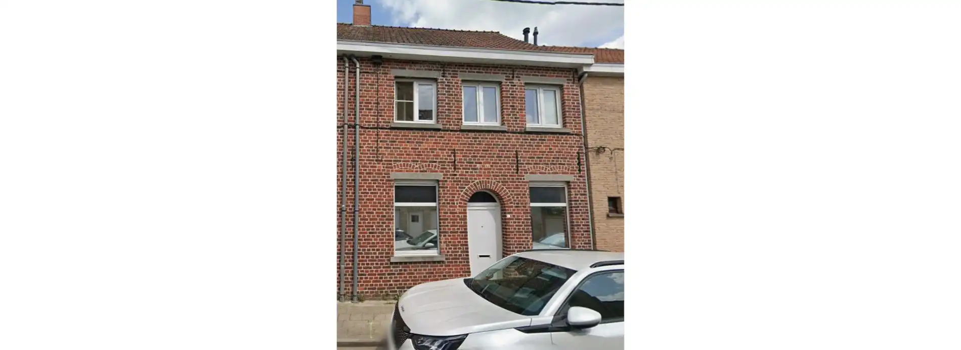 Centraal gelegen, deels te renoveren woning foto 9